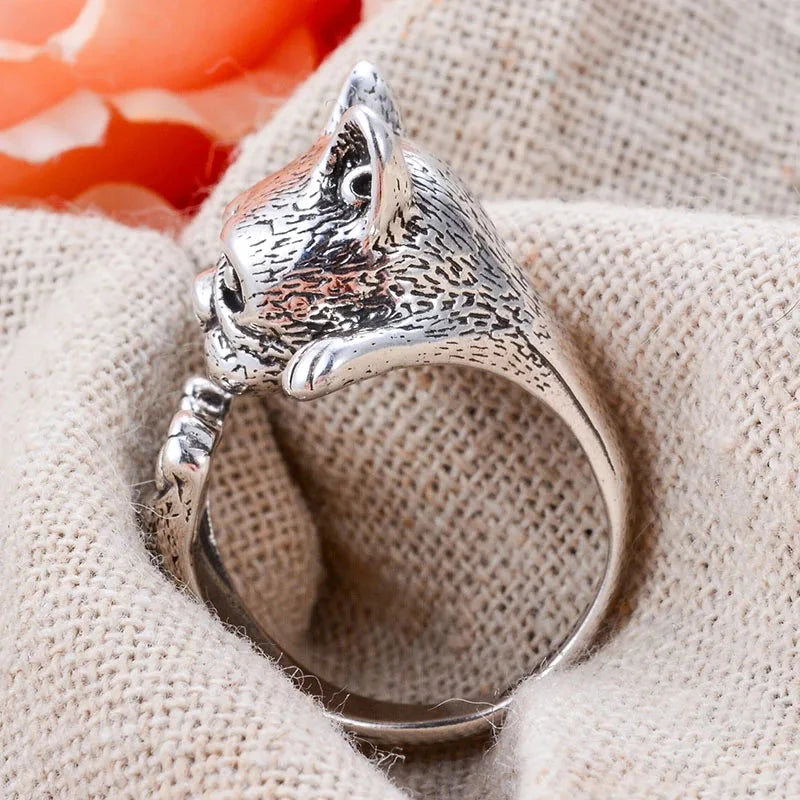 charming french bulldog silver ring elegant gift for women. Silver dog-shaped ring on a finger with a blurred background 4